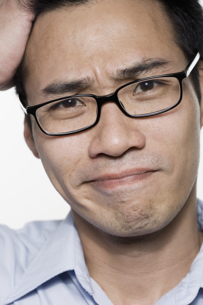 Picture of a man with glasses and a puzzled look on his face