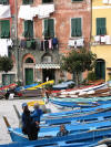 Family with boats and cats in Vernazza
